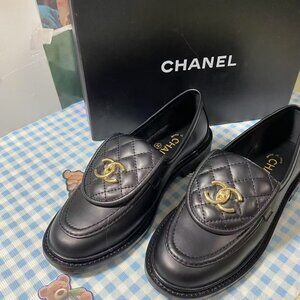 Chanel Quilted Black Loafers with Gold Emblem